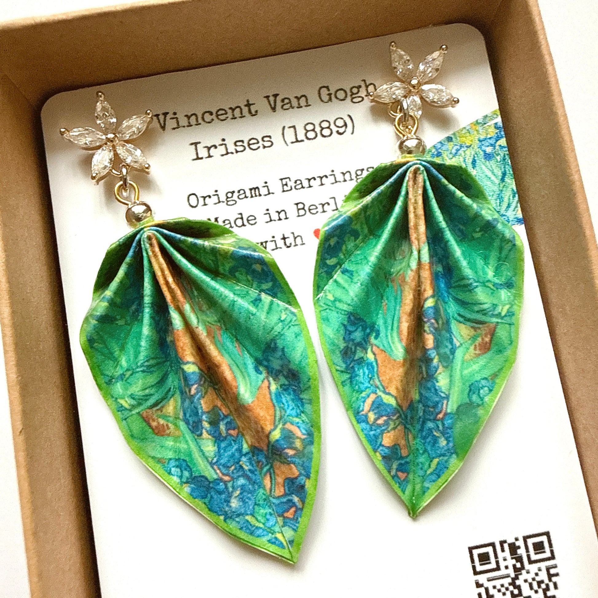 Vincent Van Gogh 'Irises' themed origami earrings with a butterfly charm on a branded card.